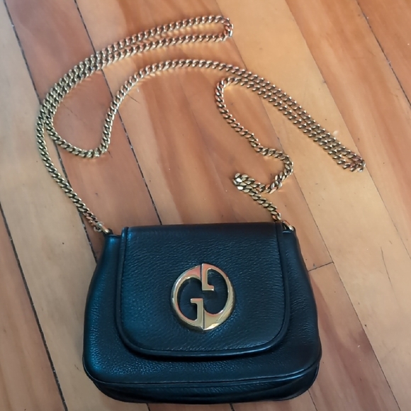 Gucci Handbags - Gucci Black Leather Crossbody with Gold Accents